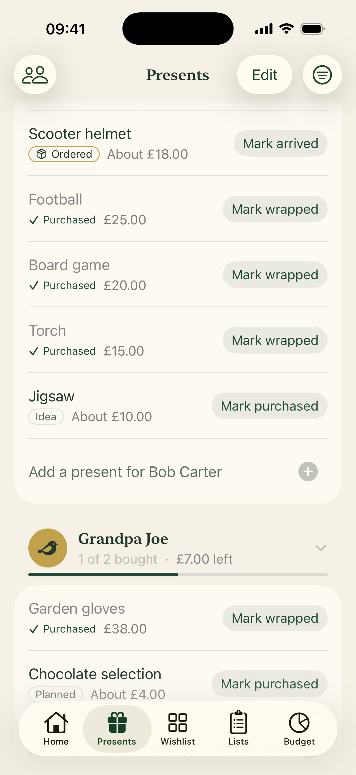Tinsel List showing a scooter helmet marked ordered and gifts ready to wrap.